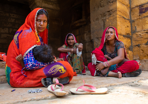 Rajasthani women sit in the street, Rajasthan, Jaisalmer, India