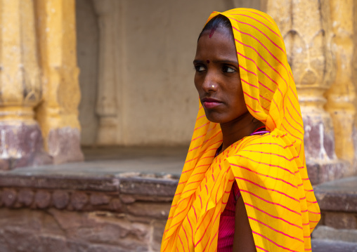 Portrait of rajasthani woman in yellow sari, Rajasthan, Jodhpur, India