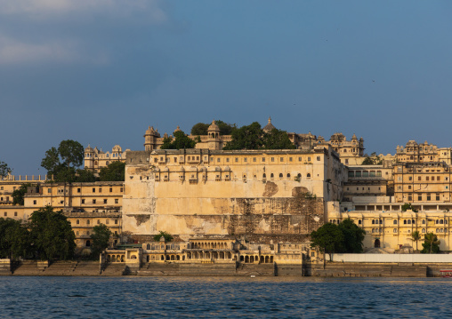 The city palace alongside lake Pichola, Rajasthan, Udaipur, India