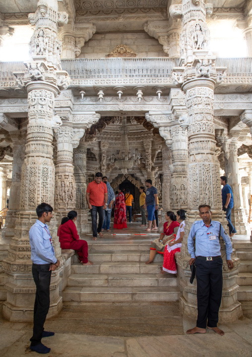 Indian tourists inside jain Tirthankar marble temple, Rajasthan, Ranakpur, India
