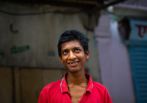 Portrait of a young indian man looking away in the street, Rajasthan, Bundi, India