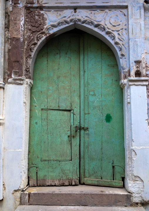 Old green door of a haveli, Rajasthan, Jodhpur, India