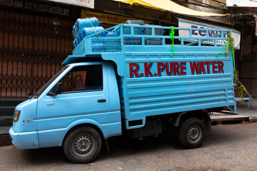 Truck in the street carrying pure water during the heat wave, Rajasthan, Jaipur, India