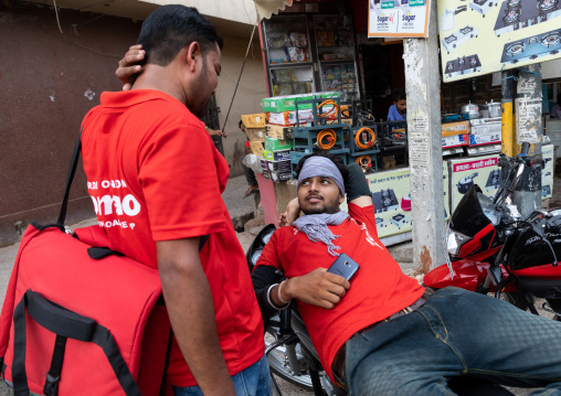 A biker from the popular take away food delivery company Zomato, Rajasthan, Bikaner, India