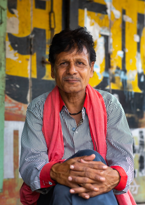 Portrait of an indian man with a pink scarf in the street, Rajasthan, Bundi, India