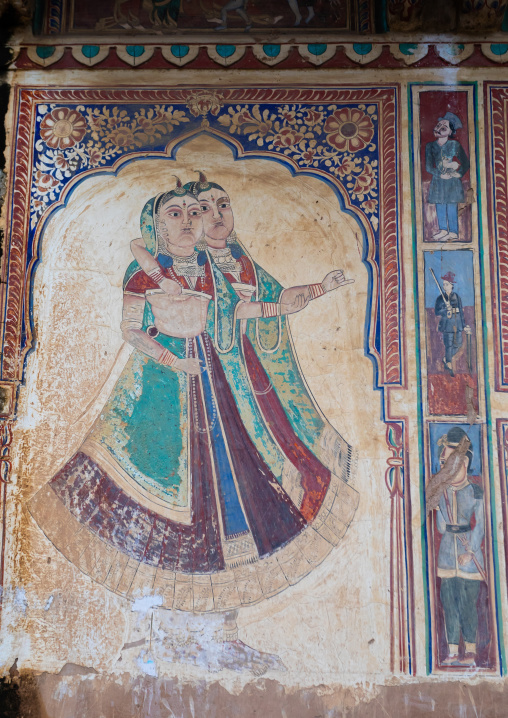 Wall paintings depicting indian people on an old haveli, Rajasthan, Nawalgarh, India