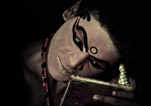 Kathakali Dancer Applying Make-up, Kochi, India