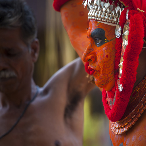 Theyyam Artist With Facial Artwork And A Look Of Concentration During The Ceremony, Thalassery, India
