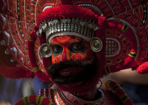 Man Dressed For Theyyam Ritual With Traditional Painting On His Face, Thalassery, India