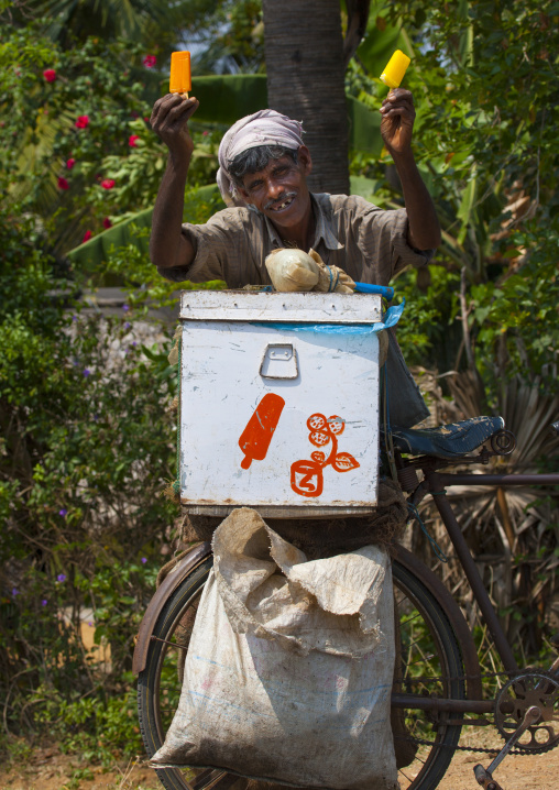 Gap-toothed Smile Of A Ice Cream Seller With His Bicycle, Mahabalipuram, India
