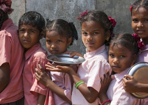 Lunchtime For These Pupils In Uniform Standing In Line With Their Plate, Mahabalipuram, India