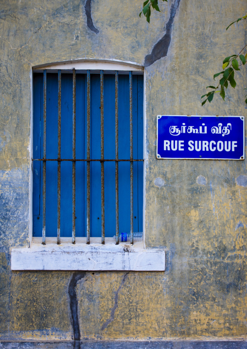 Barred Window With Blue Shutters Closed In Surcouf Street In The French Quater, Pondicherry, India