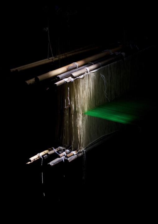 Traditional Wooden Weaving Loom In The Shadows In Motion With Green Yarn, Kumbakonam, India