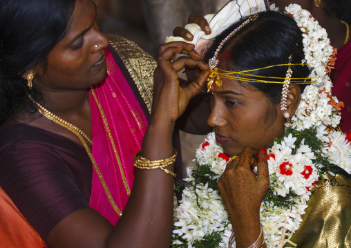 Women In Sari Preparing A Bride With Henna Tattoos For Her Wedding Tirumayam, India