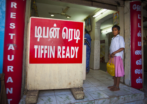 Young Gril With Short Hair Waiting At A Tiffin Restaurant's Entrance Trichy, India