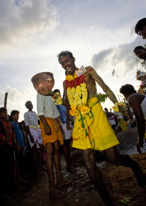 Man With Offering Holding A Jar On His Hand Relieved To Succeed Fire Walking Ritual, Madurai, South India