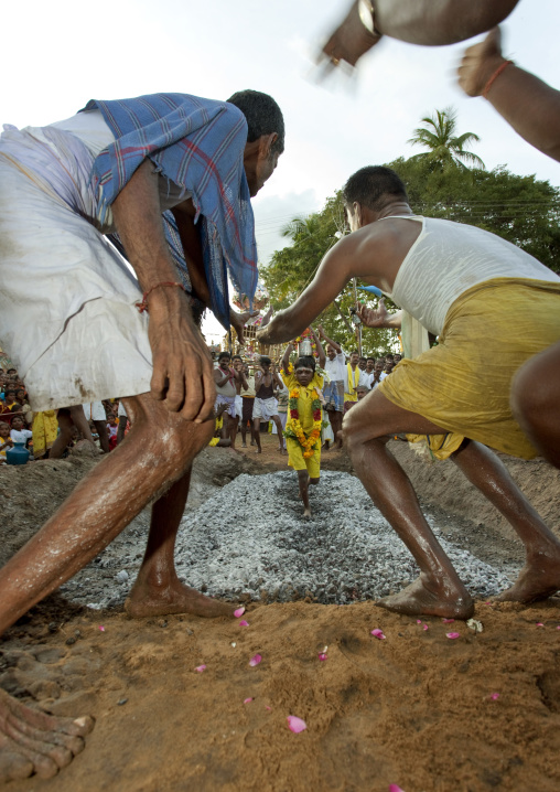 Men Waiting And Encourgaing A Little Boy With Offerings To Succeed Fire Walking Ritual, Madurai, South India