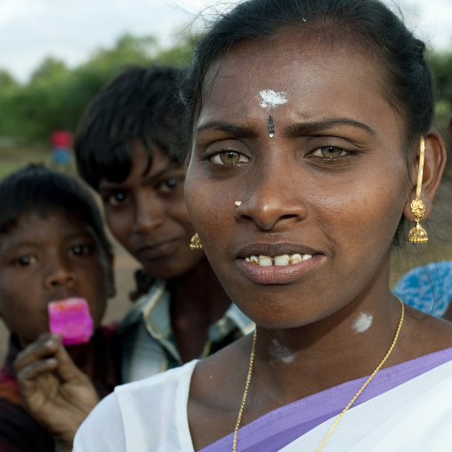 Woman And Child In The Audience During The Fire Walking Ritual, Madurai, South India