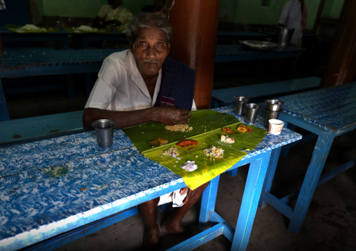 Old Seated Man During Lunchtime At A Wedding, Kumbakonam, India