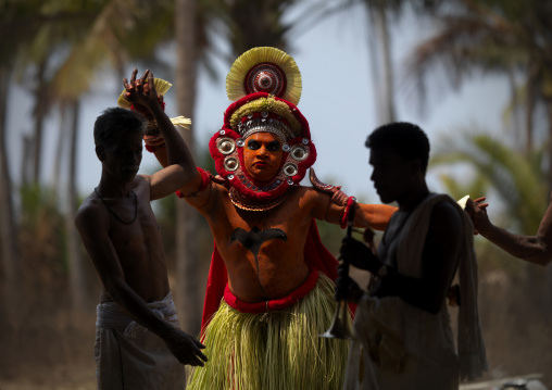 Theyyam Artist Performing Ritual Attented By Priests, Thalassery, India