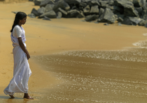 Woman Going Into The Sea For Purification During Theyyam Ceremony, Thalassery, India