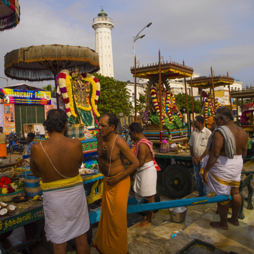 Group Of Priest Preparing Themselves Near Floats Carrying Statues Of Deities During Masi Magam Festival, Pondicherry, India