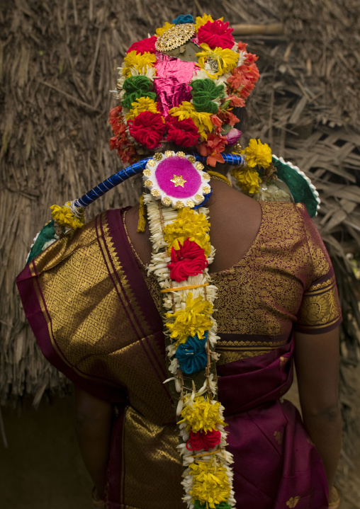 Bride In Sari Wearing A Colorful Flower Garland On Her Head For Her Wedding, Pondicherry, India