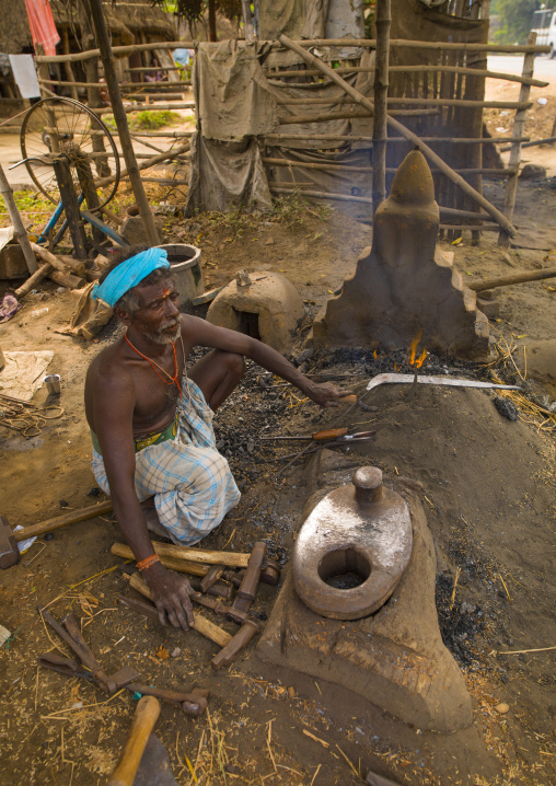 Squatting Blacksmith Forging Tools Near Pondicherry, India