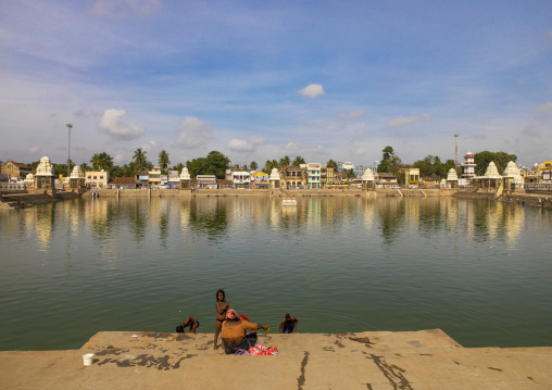 Children Taking A Bath Under The Supervision Of Their Mother In The Mahamaham Tank, Kumbakonam, India