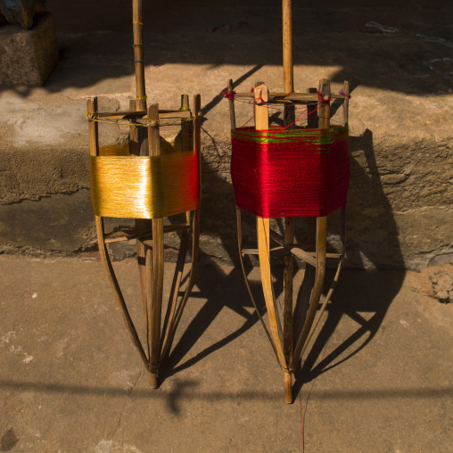 Traditional Wooden Spools Of Red And Golden Yarn, Kumbakonam, India