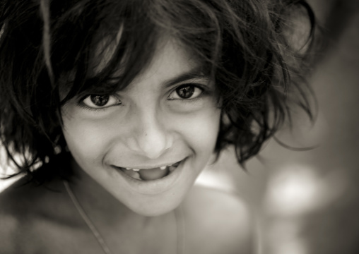 Young Gap-toothed Girl Smiling At The Camera Madurai, India