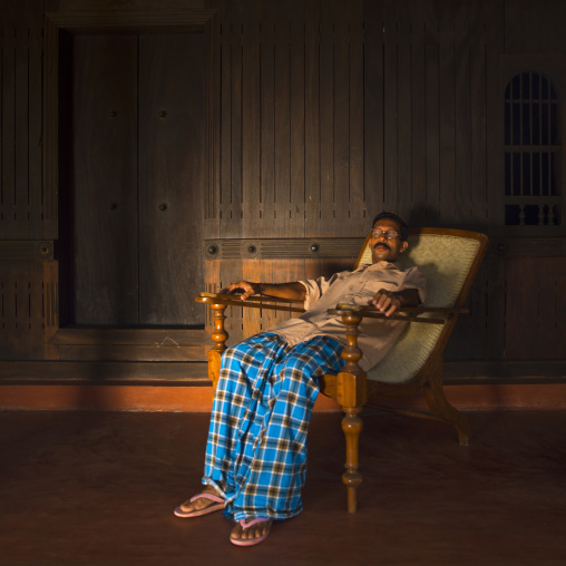 Man Resting In A Long Chair, Alleppey, India