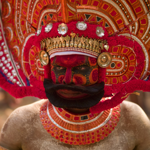 Man Dressed For Theyyam Ritual With Traditional Painting On His Face, Thalassery, India