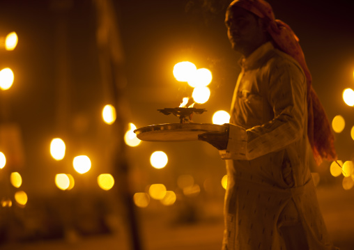Man Holding Sacred Fire, Maha Kumbh Mela, Allahabad, India