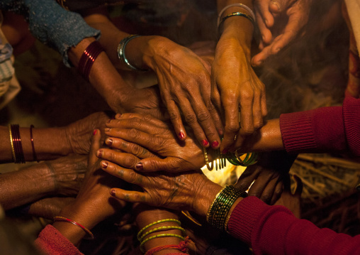 Women Putting Hands Over A Fire, Maha Kumbh Mela, Allahabad, India