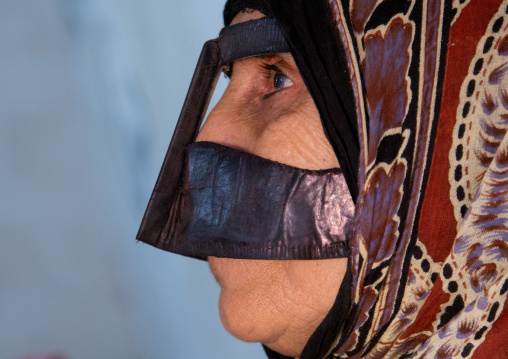 a bandari woman wearing a traditional mask called the burqa, Qeshm Island, Salakh, Iran