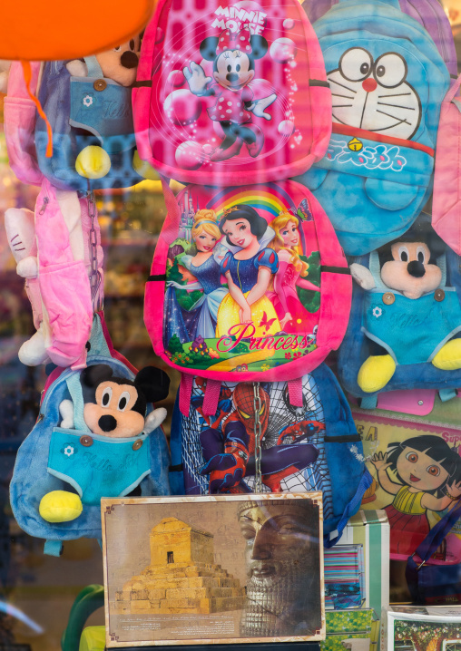 walt disney bags mixed and persian poster in a shop, Hormozgan, Bandar Abbas, Iran