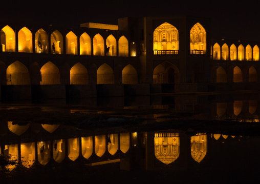a view of the khaju bridge at night highlighting the arches, Isfahan Province, isfahan, Iran