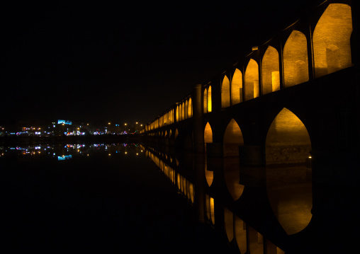a view of the si-o-seh bridge at night highlighting the 33 arches, Isfahan Province, isfahan, Iran