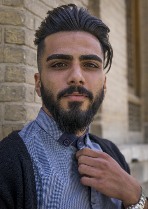 Young man with western haircut in the bazaar, Isfahan province, Isfahan, Iran
