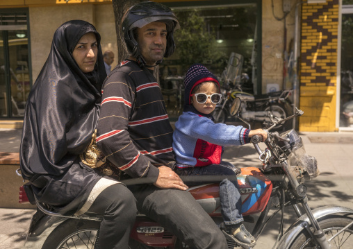 Family on a motorbike, Shemiranat county, Tehran, Iran