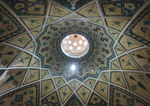 Ceiling with its intricate and elaborate patterns and internal stainless glass dome in sultan amir ahmad bathhouse ceiling, Isfahan province, Kashan, Iran