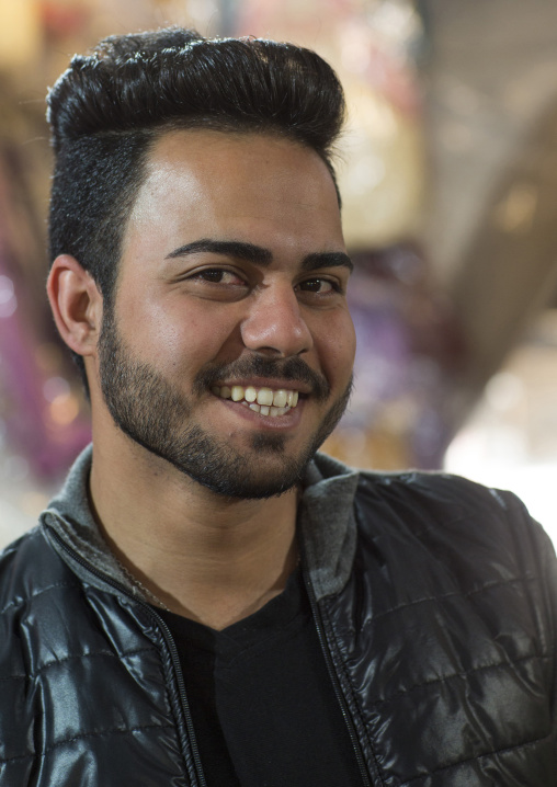 Young man with western haircut in the bazaar, Isfahan province, Isfahan, Iran