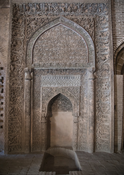 Ornate arabic calligraphy on the Oljeitu mihrab at the Jameh masjid or Friday mosque, Isfahan Province, Isfahan, Iran