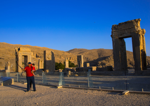 Tourist taking a selfie in the site of Persepolis, Fars Province, Marvdasht, Iran