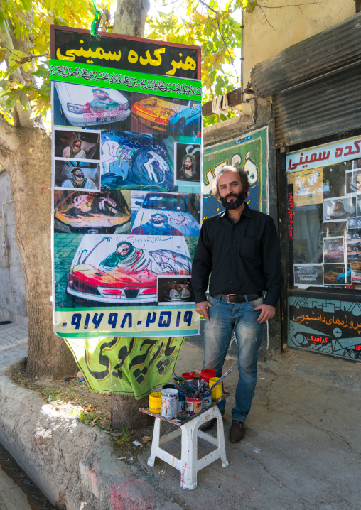 An artist who paints the cars for Muharam to commemorate the martyrdom anniversary of Hussein, Lorestan Province, Khorramabad, Iran