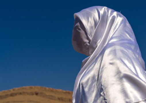 Woman in white chador during a traditional religious theatre called tazieh about Imam Hussein death in Kerbala, Lorestan Province, Khorramabad, Iran