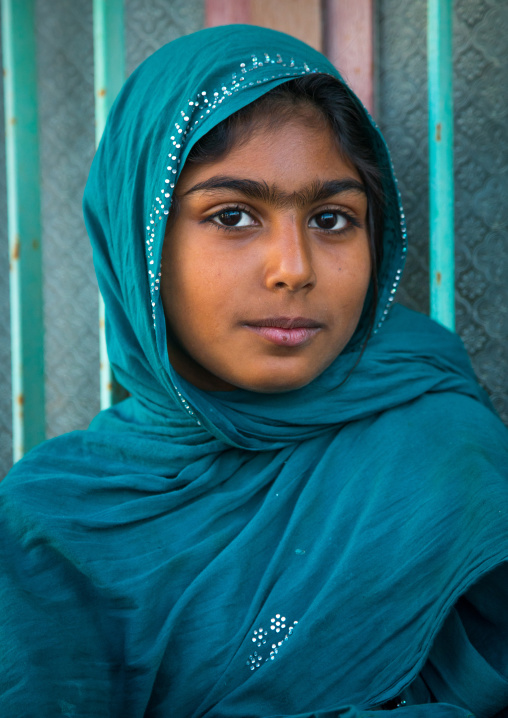 young veiled girl with big eyebrows, Qeshm Island, Salakh, Iran
