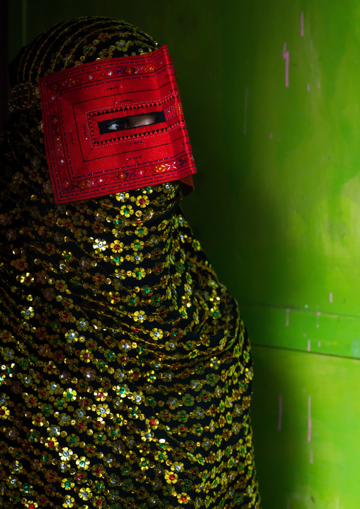a bandari woman wearing a traditional mask called the burqa, Hormozgan, Minab, Iran