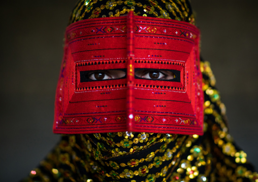a bandari woman wearing a traditional mask called the burqa, Hormozgan, Minab, Iran